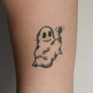 tattoo of a ghost holding a flower